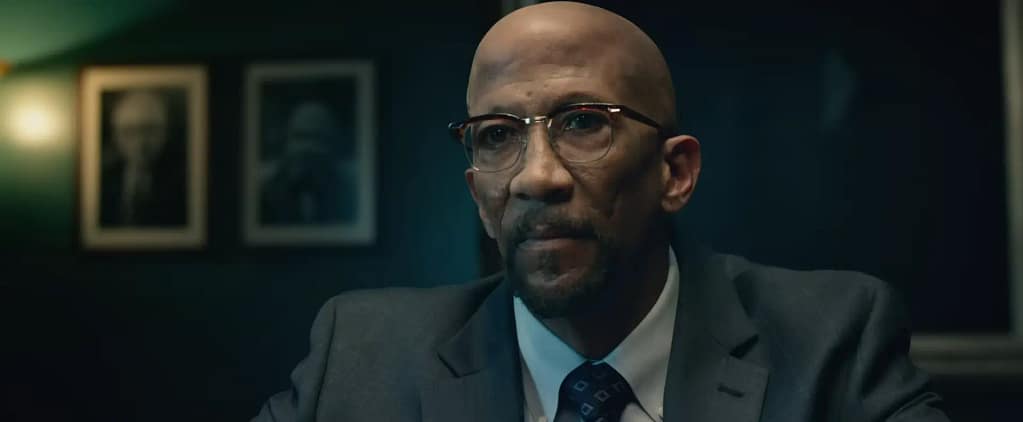 Reg E. Cathey as Dr. Franklin Storm giving a serious expression in Fantastic Four (2015). Image credit: Fantastic Four film still - via 20th Century Studios/YouTube.