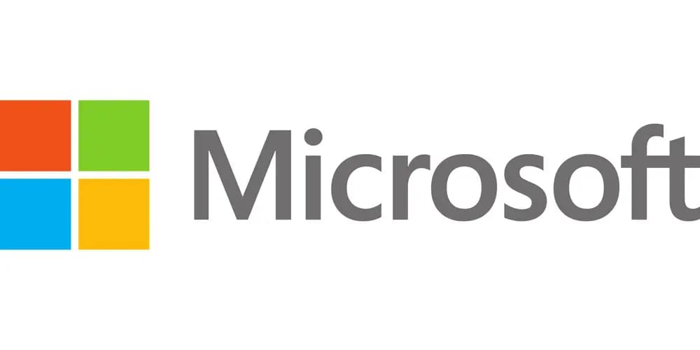 Official Microsoft logo on a clean white background. Credit: Image by Simon from Pixabay.