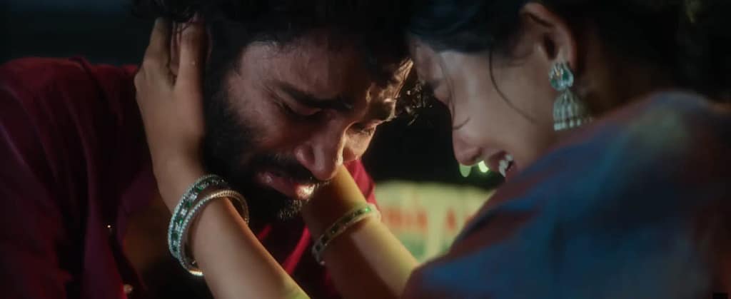 An intense emotional moment in Dude (2025) featuring Pradeep Ranganathan and Mamitha Baiju crying during a confrontation.