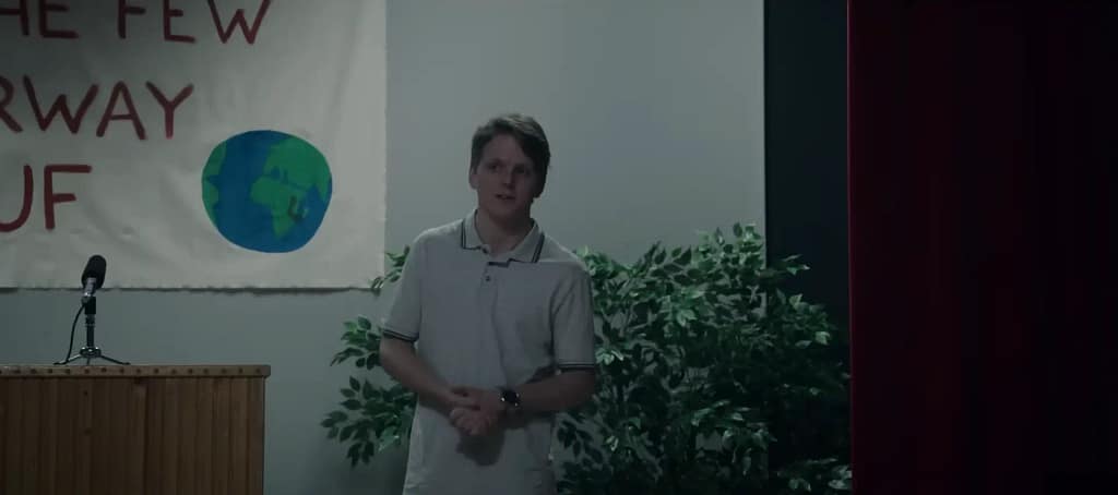 A young Viljar Hanssen played by Jonas Strand Gravli giving a speech at the summer camp before the tragic events of 22 July.