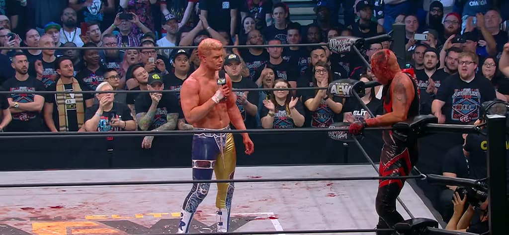 Cody speaking to brother, Dustin Rhodes at the end of their timeless match at Double or Nothing 2019.