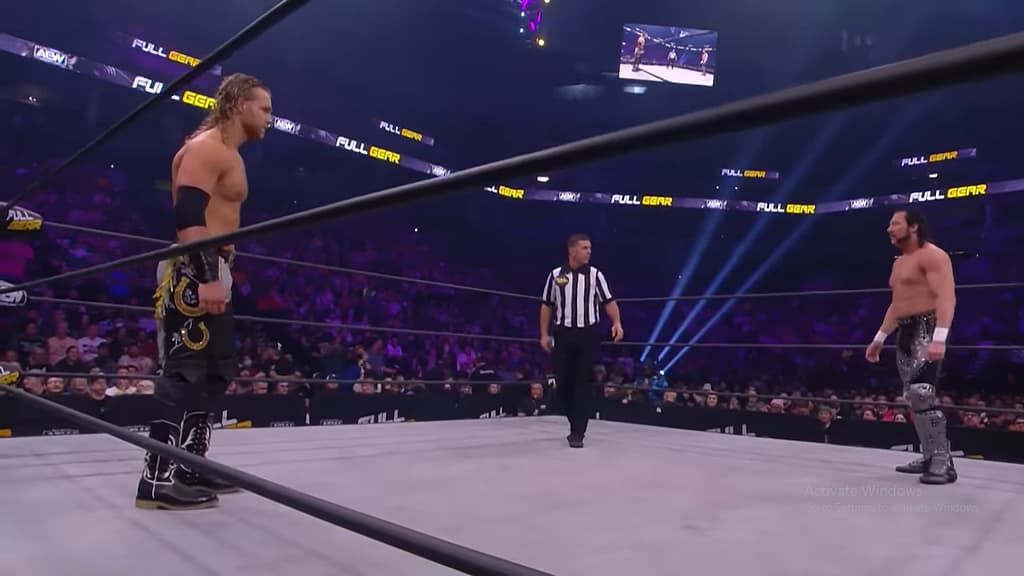 Hangman Adam Page facing off against Kenny Omega for the AEW Championship at Full Gear 2021