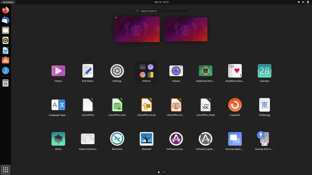 Ubuntu App Launcher view on DistroWatch, showing the 9-dot grid icon and available applications.