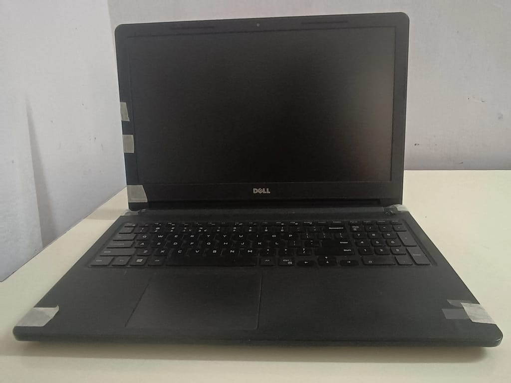 Front view of a laptop chassis held together by tape