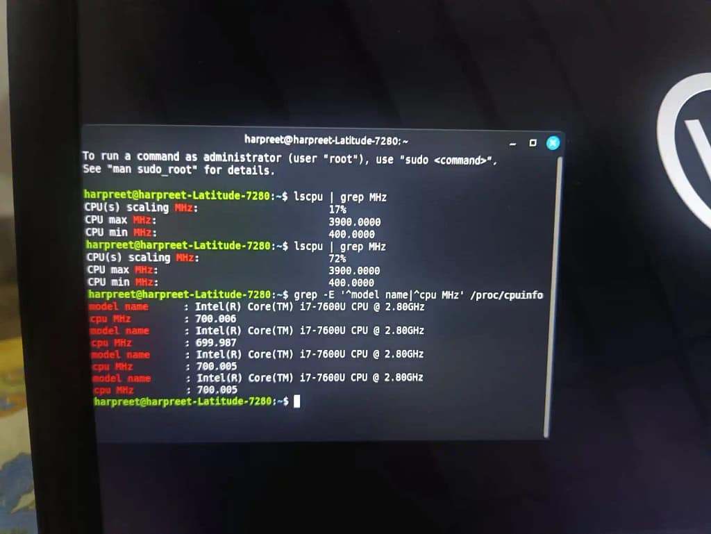 Terminal output showing Intel i7-7600U CPU cores locked at 700MHz on Linux Mint Cinnamon.