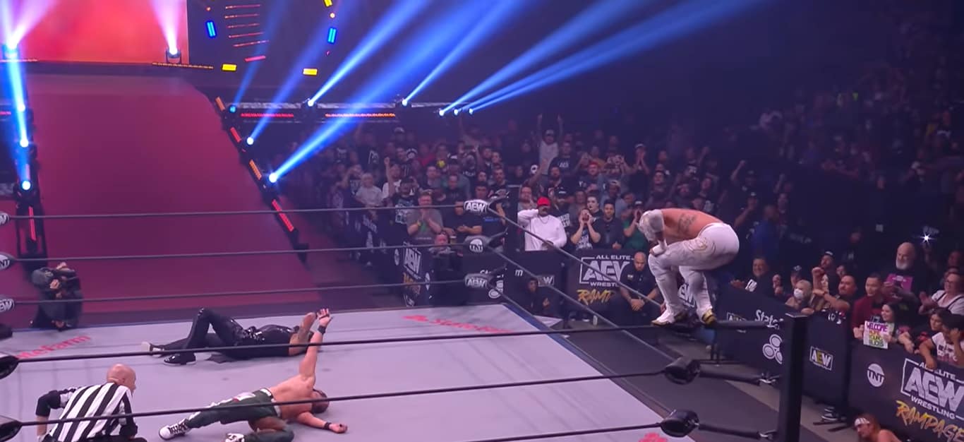Rey Fenix preparing a high-flying move on Nick Jackson during AEW Rampage.